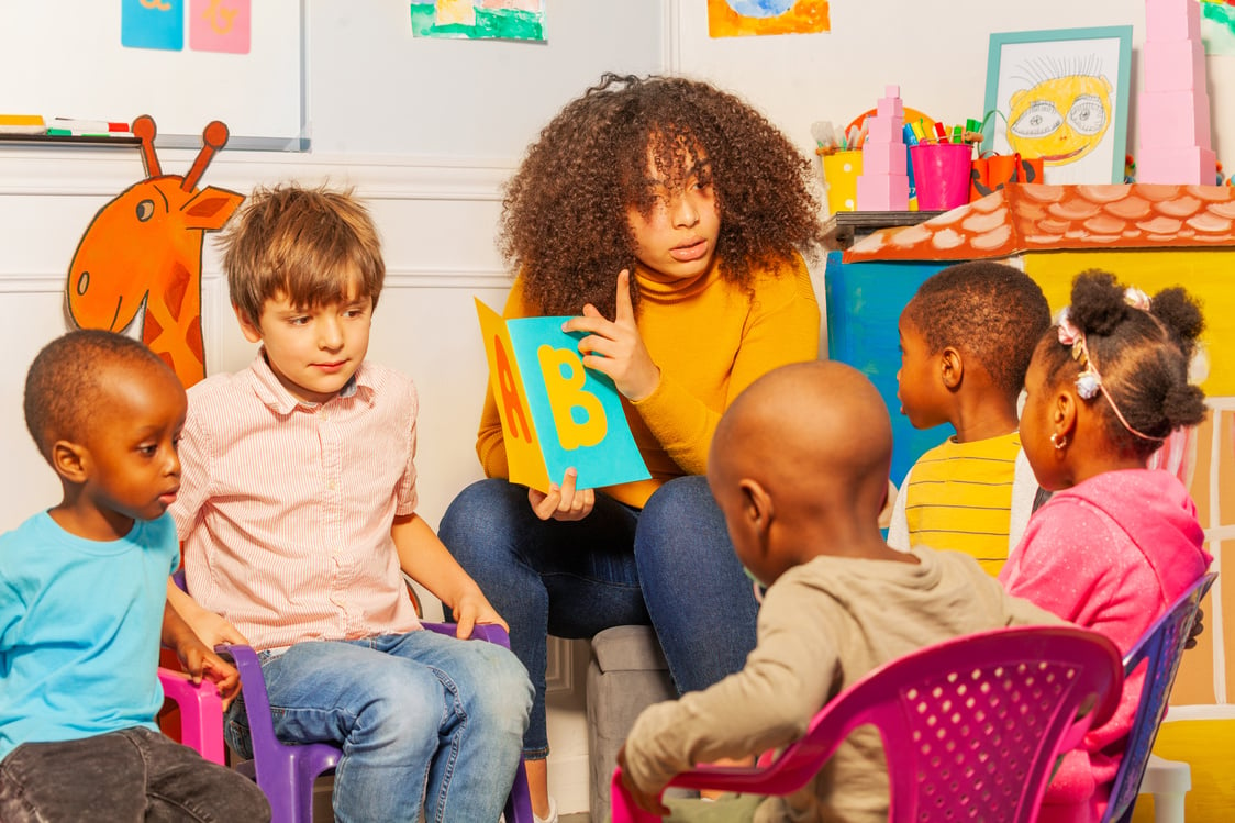 Little Kids Learning Letters on Alphabet in Nursery