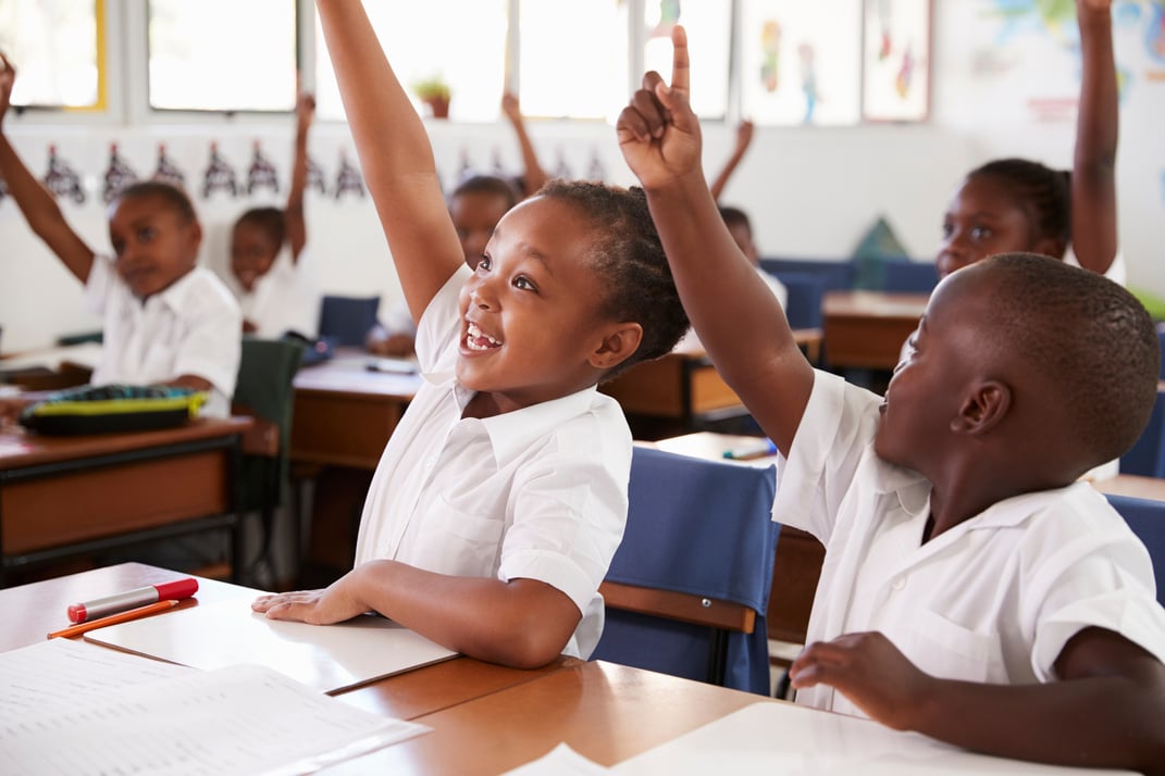 Kids Raising Hands during Elementary School 